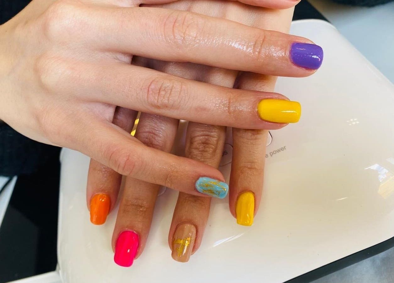 Vibrant nail art at Naina Brow Bar, Dublin7, County Dublin, IE with colorful designs on nails.
