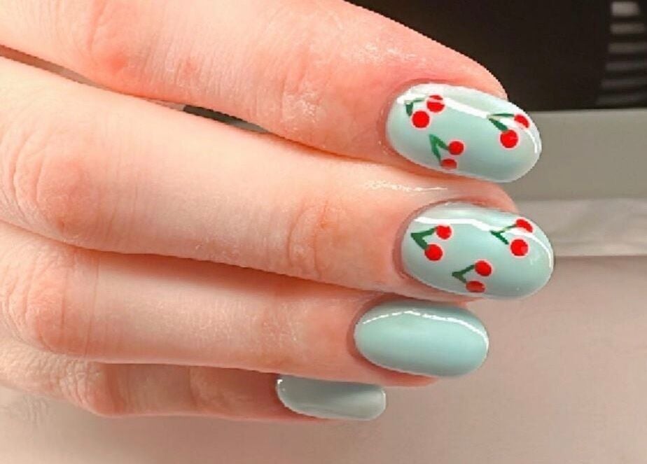 Manicured nails with cherry art at Naina Brow Bar, Dublin7, County Dublin, IE.
