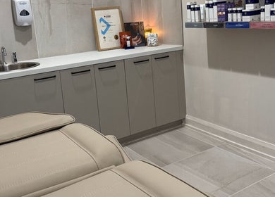 Elegant treatment room at Skin By Sar in Seymour, Victoria, AU featuring a cozy bed and skincare products.