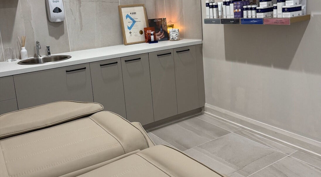 Elegant treatment room at Skin By Sar in Seymour, Victoria, AU featuring a cozy bed and skincare products.