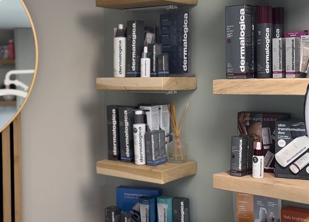 CMBeauty product display with skincare items on wooden shelves in Ashton-in-Makerfield, England, GB.
