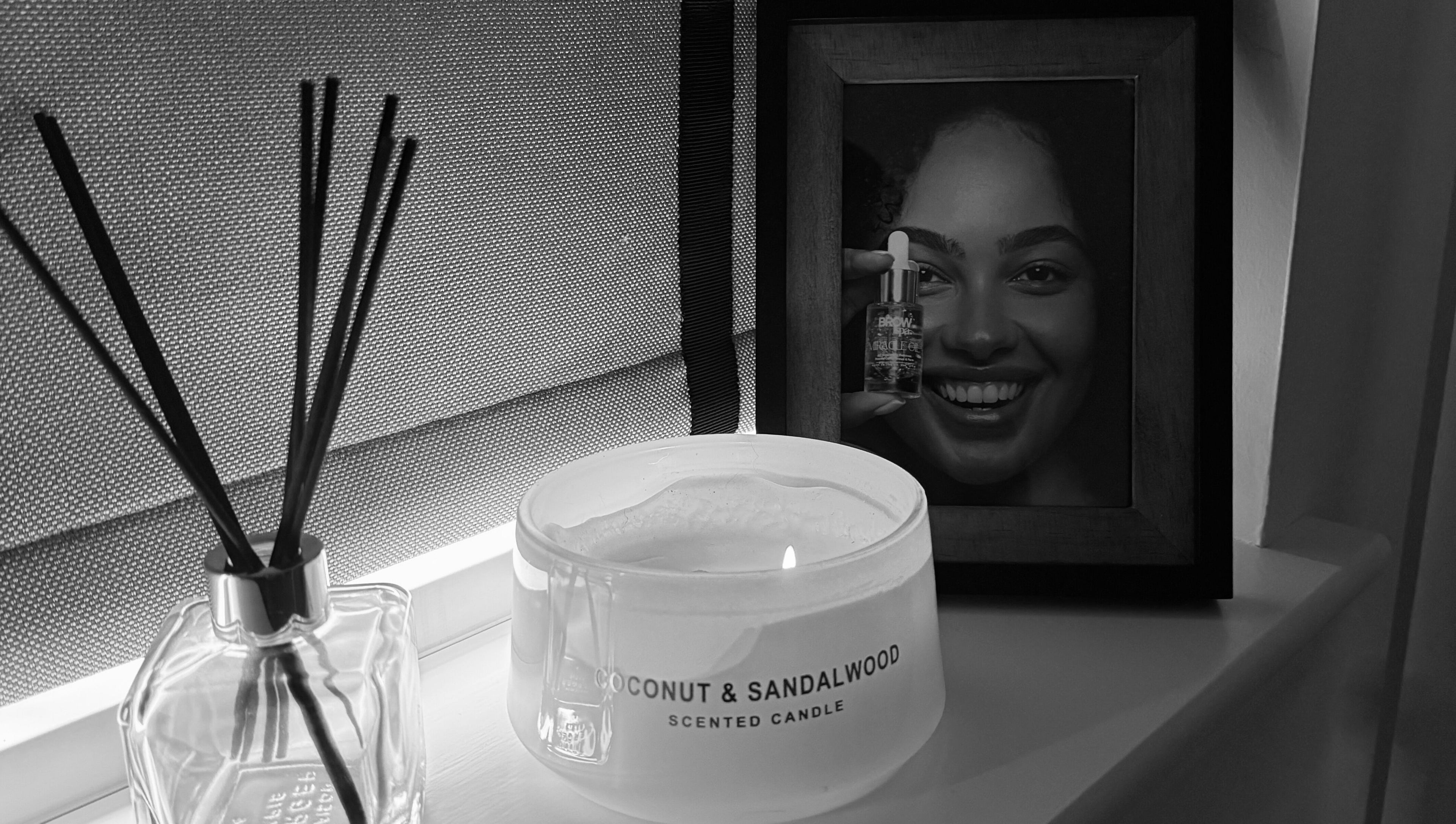 Cozy setup with candle and photo at The Brow Bar, Inverurie, Scotland, GB.