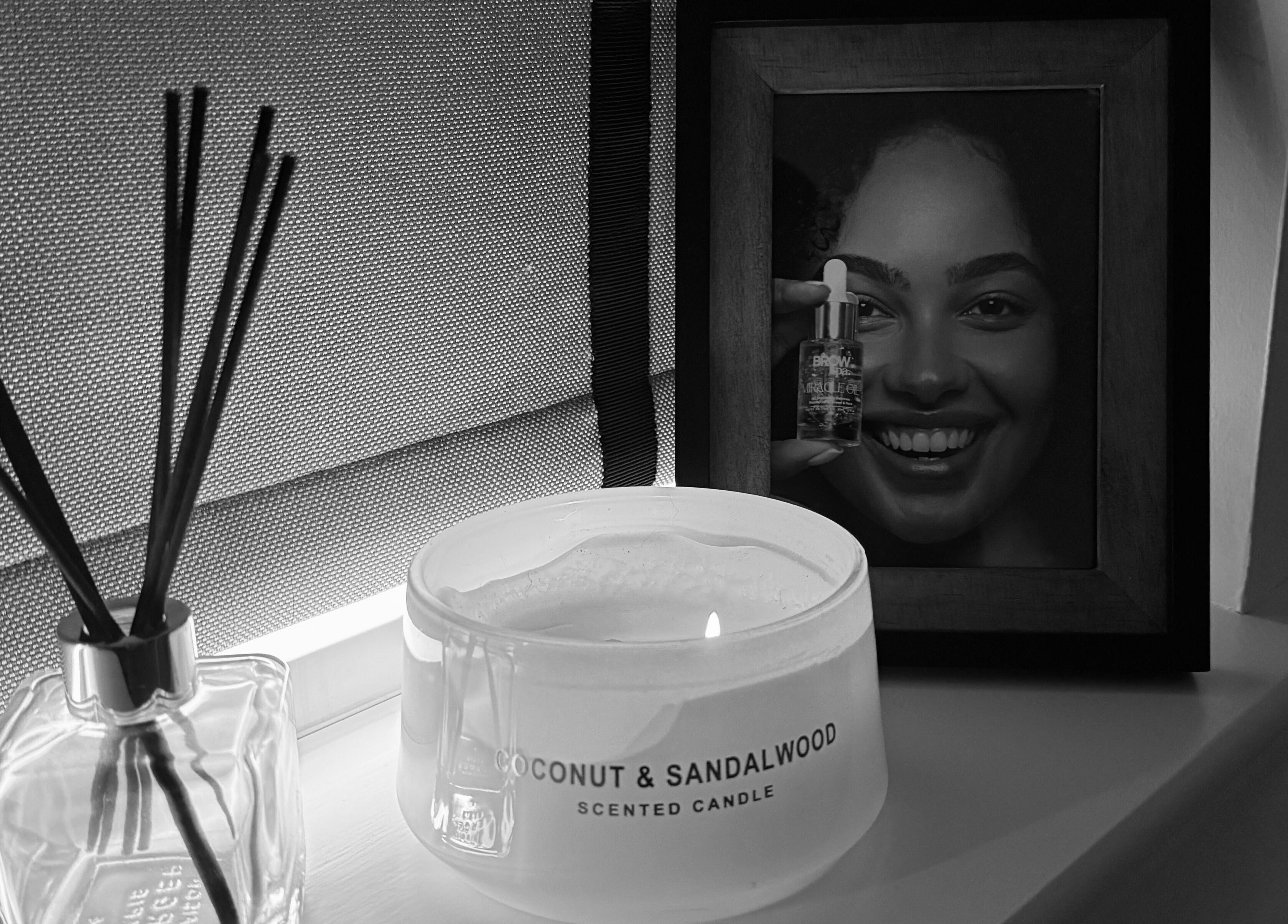 Cozy setup with candle and photo at The Brow Bar, Inverurie, Scotland, GB.