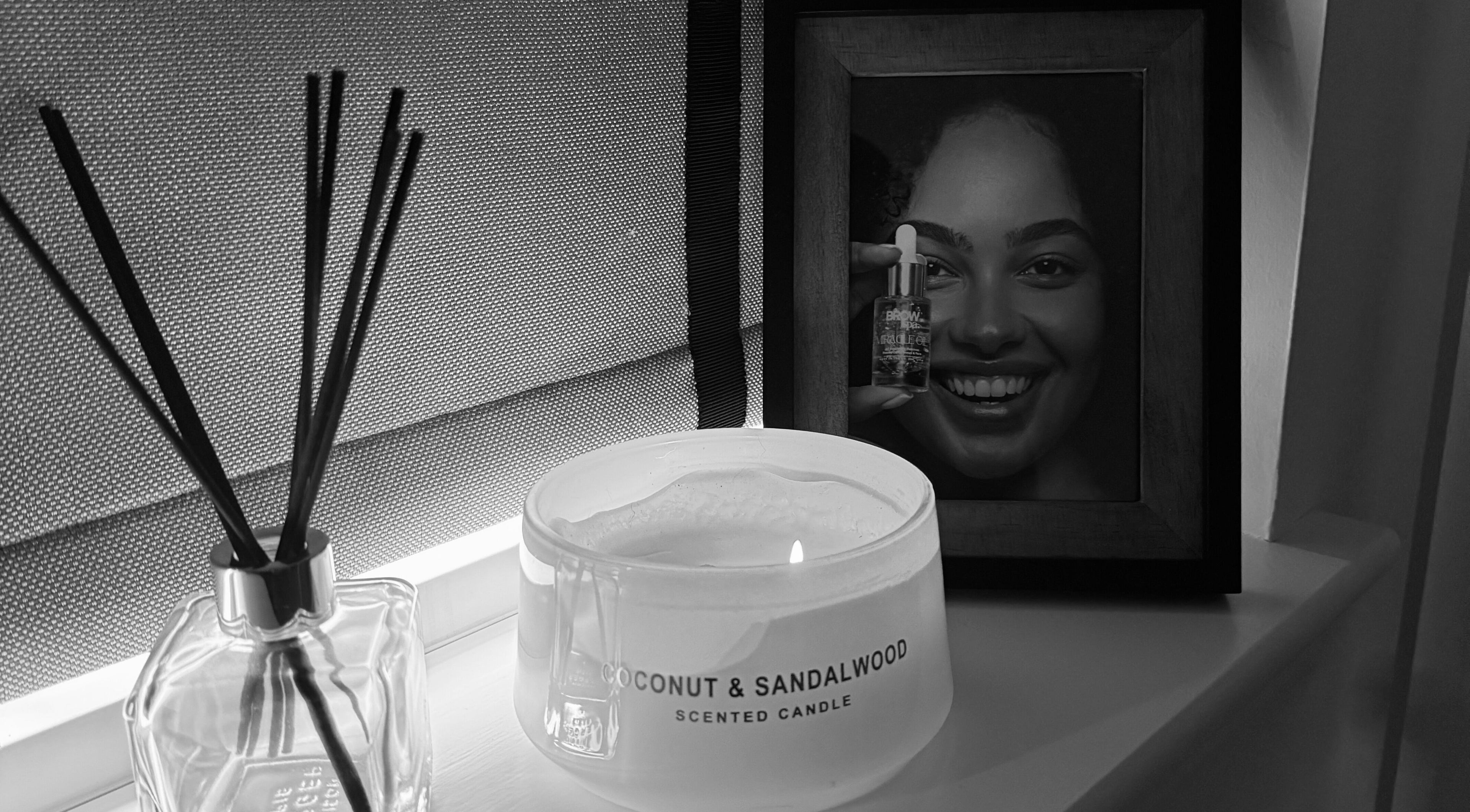 Cozy setup with candle and photo at The Brow Bar, Inverurie, Scotland, GB.