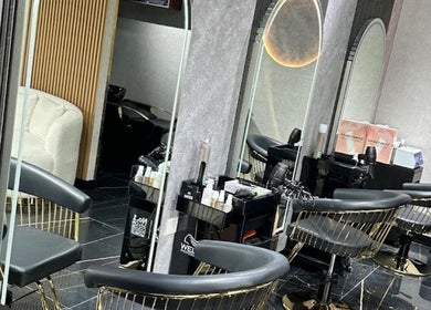 Elegant salon chairs at The Luxury Touch Beauty Salon, Dubai, Dubai, AE, offer ultimate comfort and style.