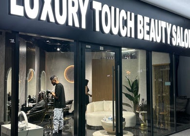 Exterior view of The Luxury Touch Beauty Salon in Dubai, Dubai, AE with chic modern decor.