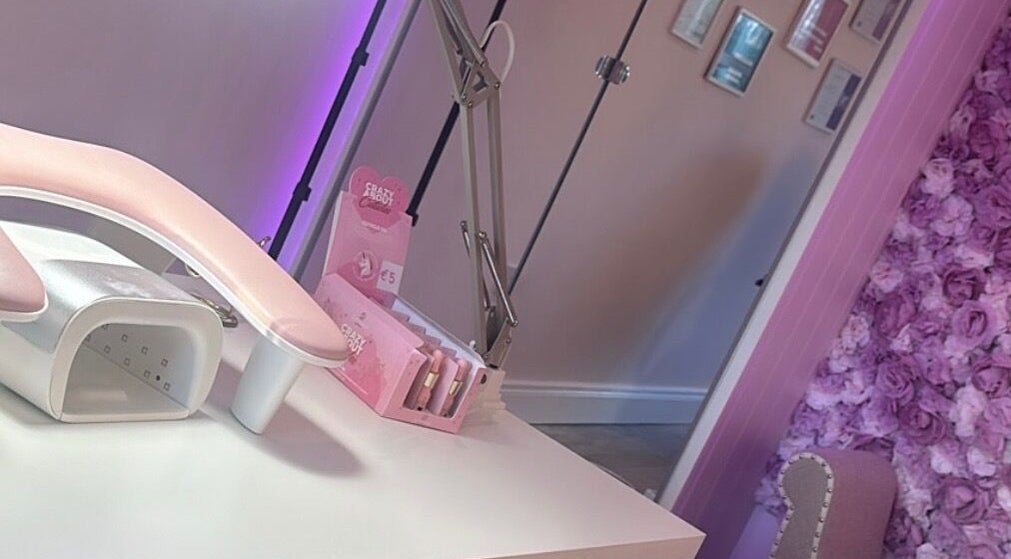 Nail station at Amy’s Beauty Aesthetics, County Meath/ Kildare, IE with pink decor and nail tools.