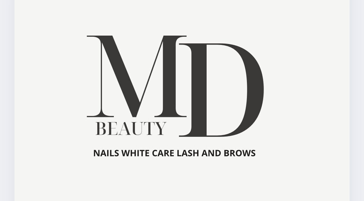 Logo de Md Beauty à Buchy, Normandie, FR, mettant en valeur les soins de beauté et bien-être.
