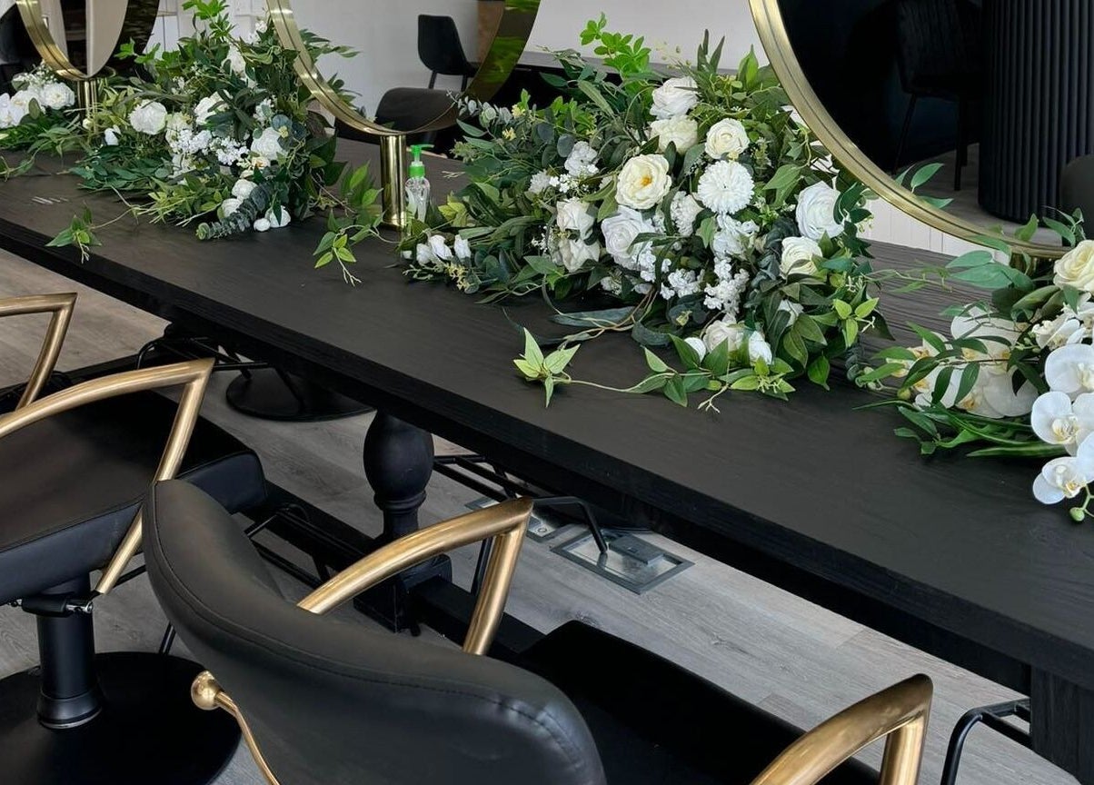 Stylish salon chairs and floral decor at Magnolia Beauty Bar, Mildura, Victoria, AU.