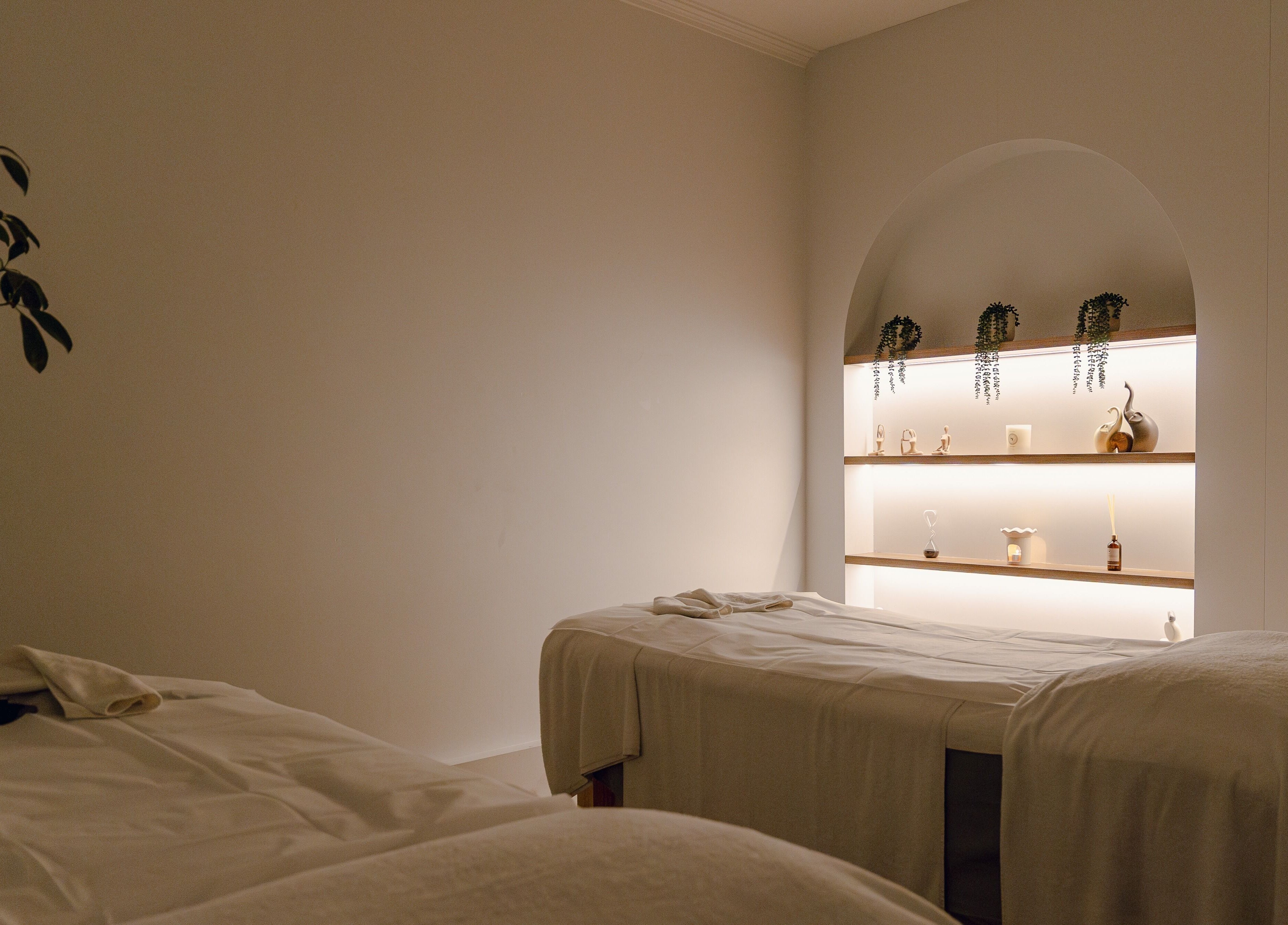 Relaxing treatment room at Newleaf Spa in Melbourne, Victoria, AU. Featuring elegant decor and calming ambiance.