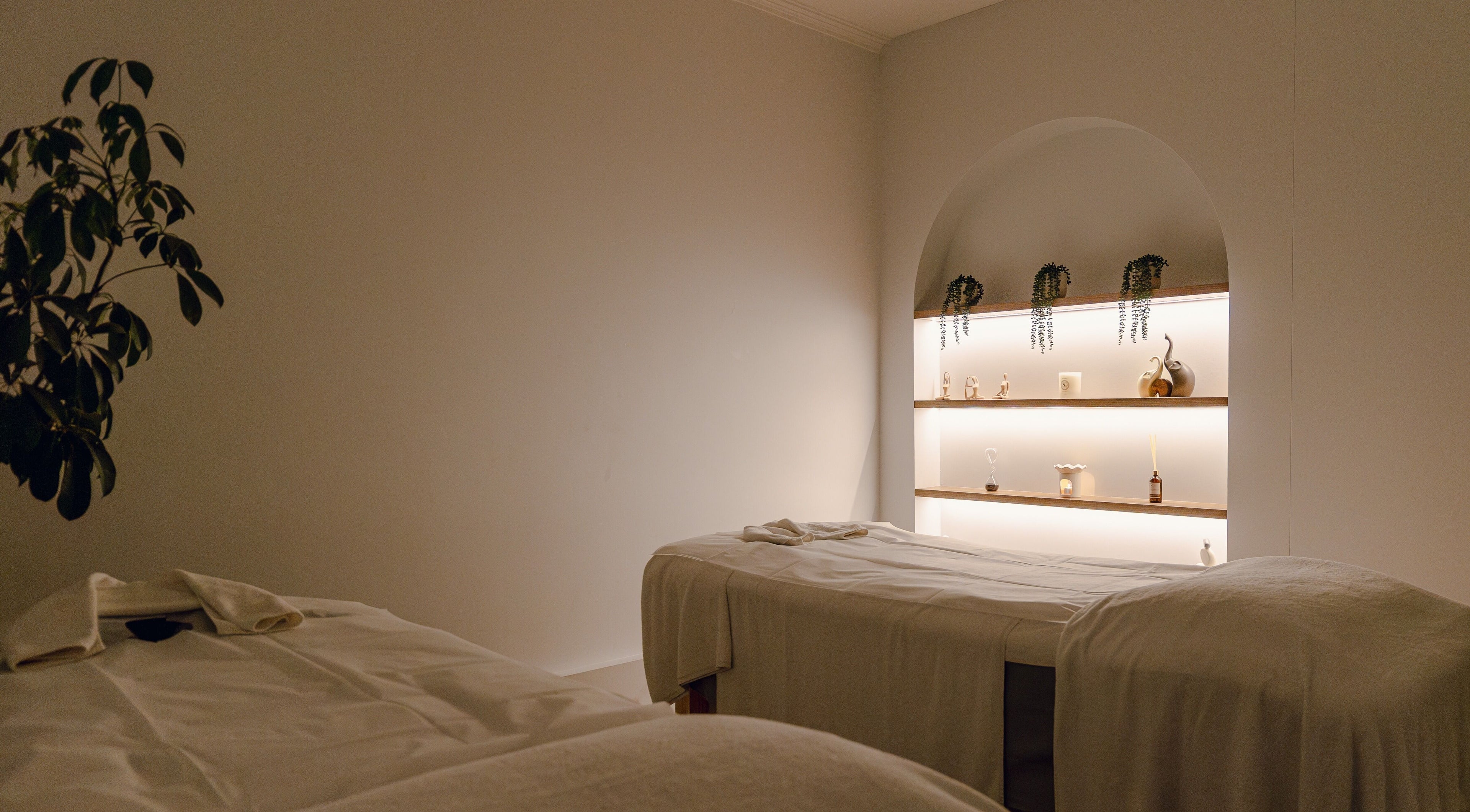 Relaxing treatment room at Newleaf Spa in Melbourne, Victoria, AU. Featuring elegant decor and calming ambiance.