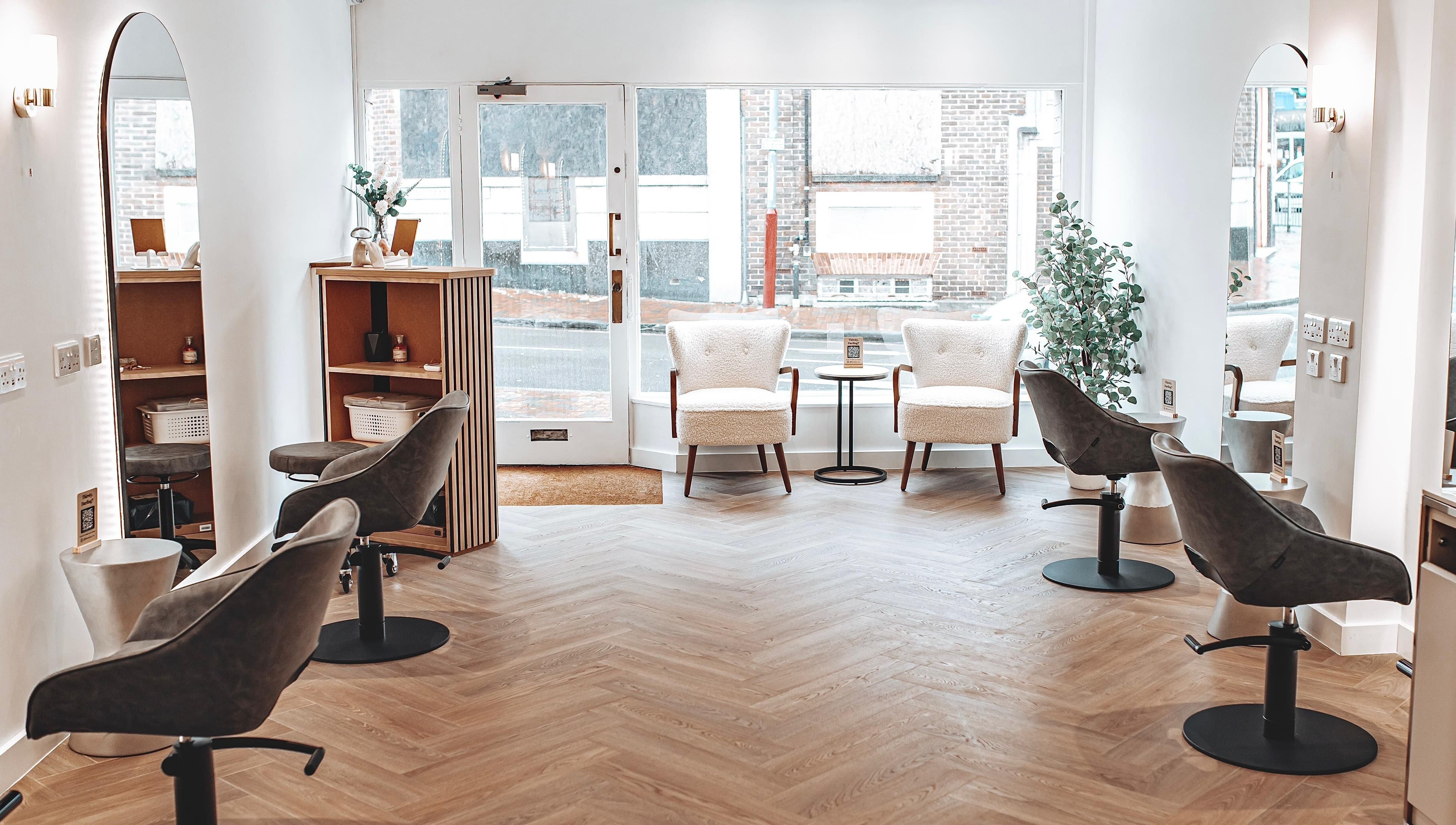 Relaxing interior of Flow, Royal Tunbridge Wells, England, GB, featuring modern chairs and elegant decor.