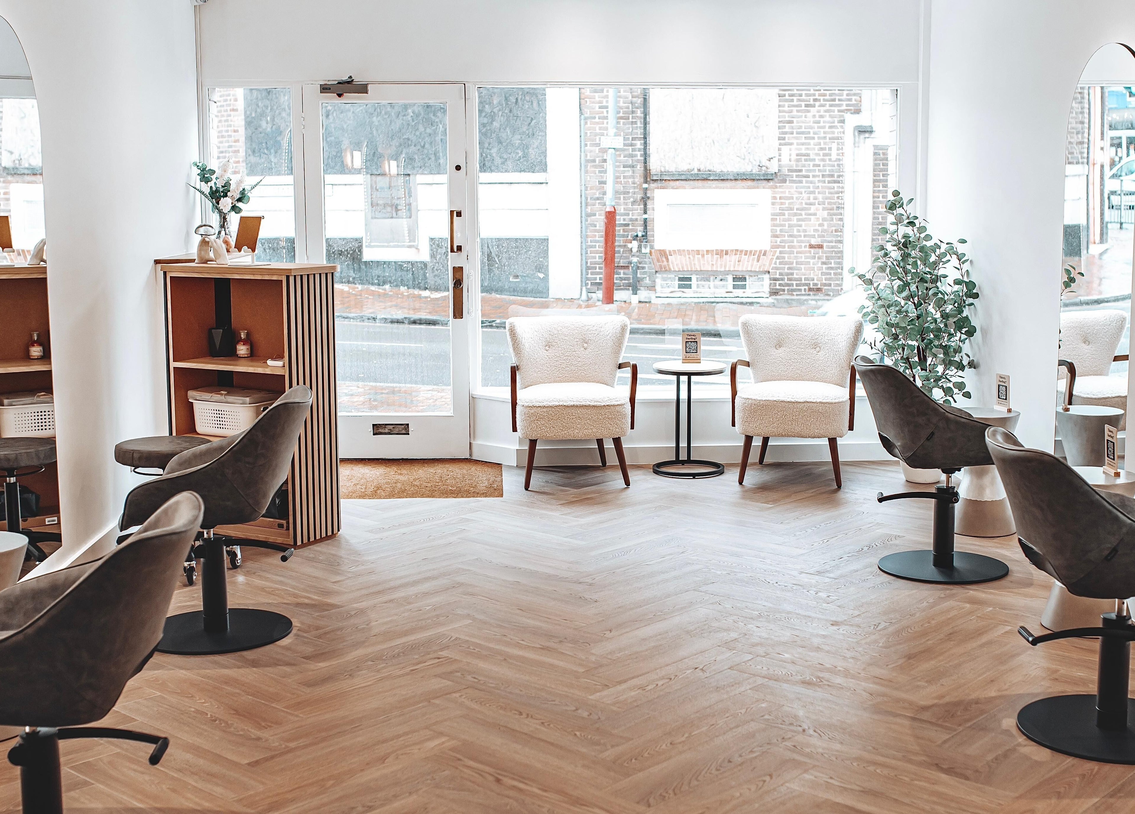 Relaxing interior of Flow, Royal Tunbridge Wells, England, GB, featuring modern chairs and elegant decor.