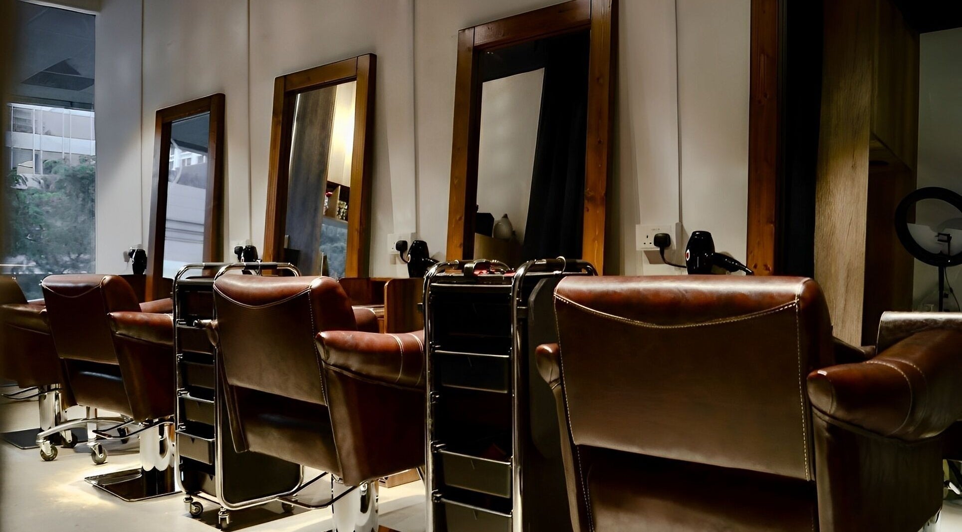 Elegant salon chairs and mirrors at Hair Eclipse, Singapore, Singapore, SG for premium beauty services.