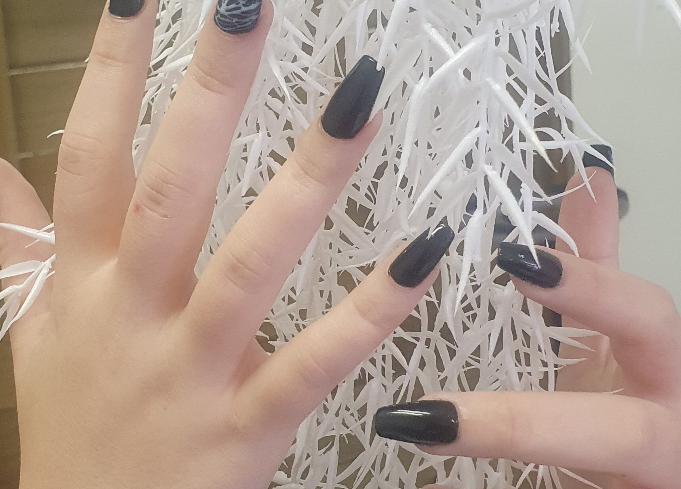 Elegant manicured nails at BeBe salon, Cape Town, Western Cape, ZA, showcasing stylish nail art.