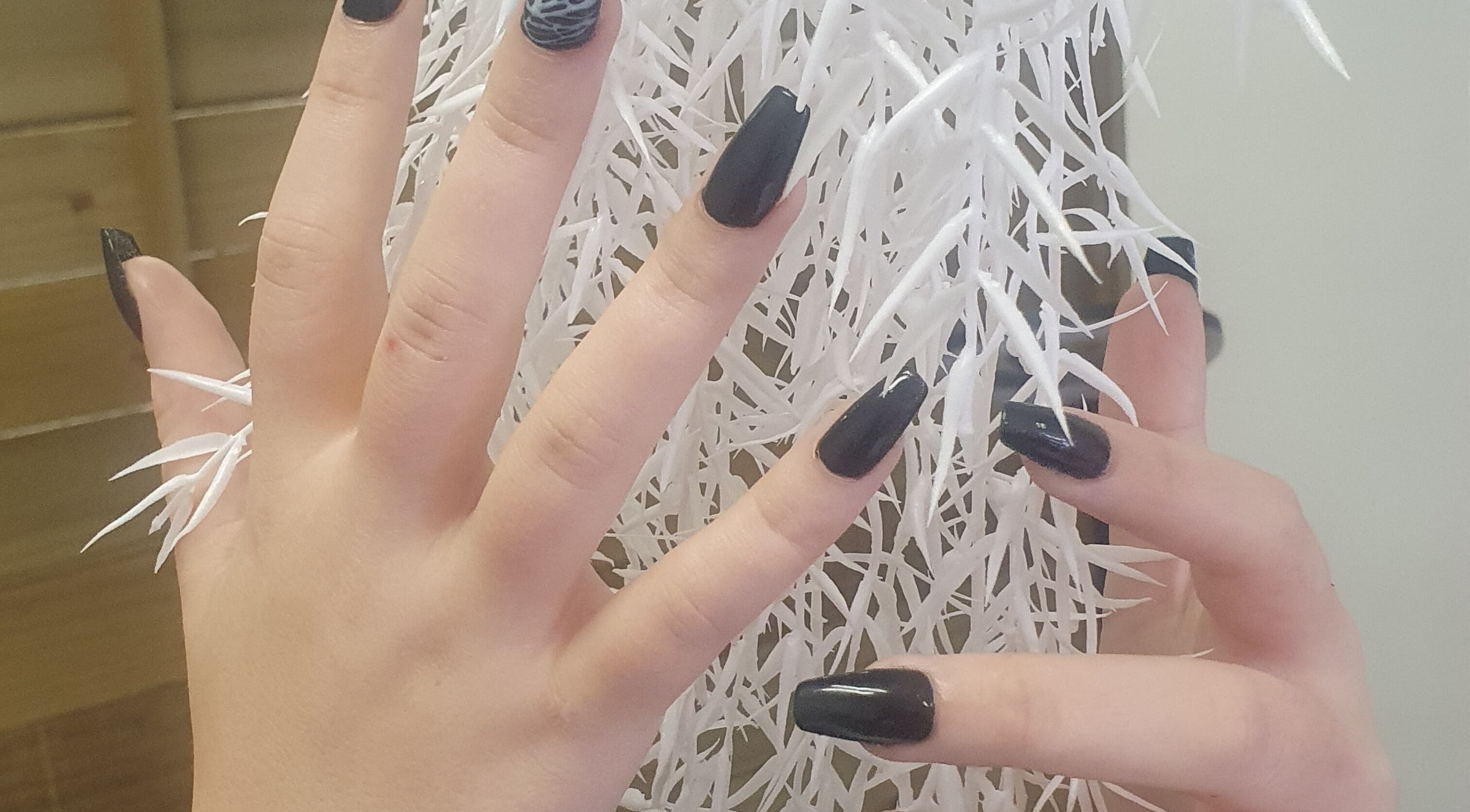 Elegant manicured nails at BeBe salon, Cape Town, Western Cape, ZA, showcasing stylish nail art.