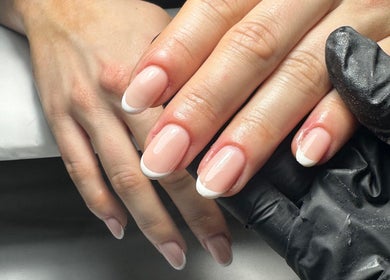 French manicure at The Nail Vault, Plymouth, England, GB showcases elegant and polished nails.