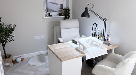 Elegant nail treatment area at The Nail Vault, Plymouth, England, GB featuring plush seating and modern decor.