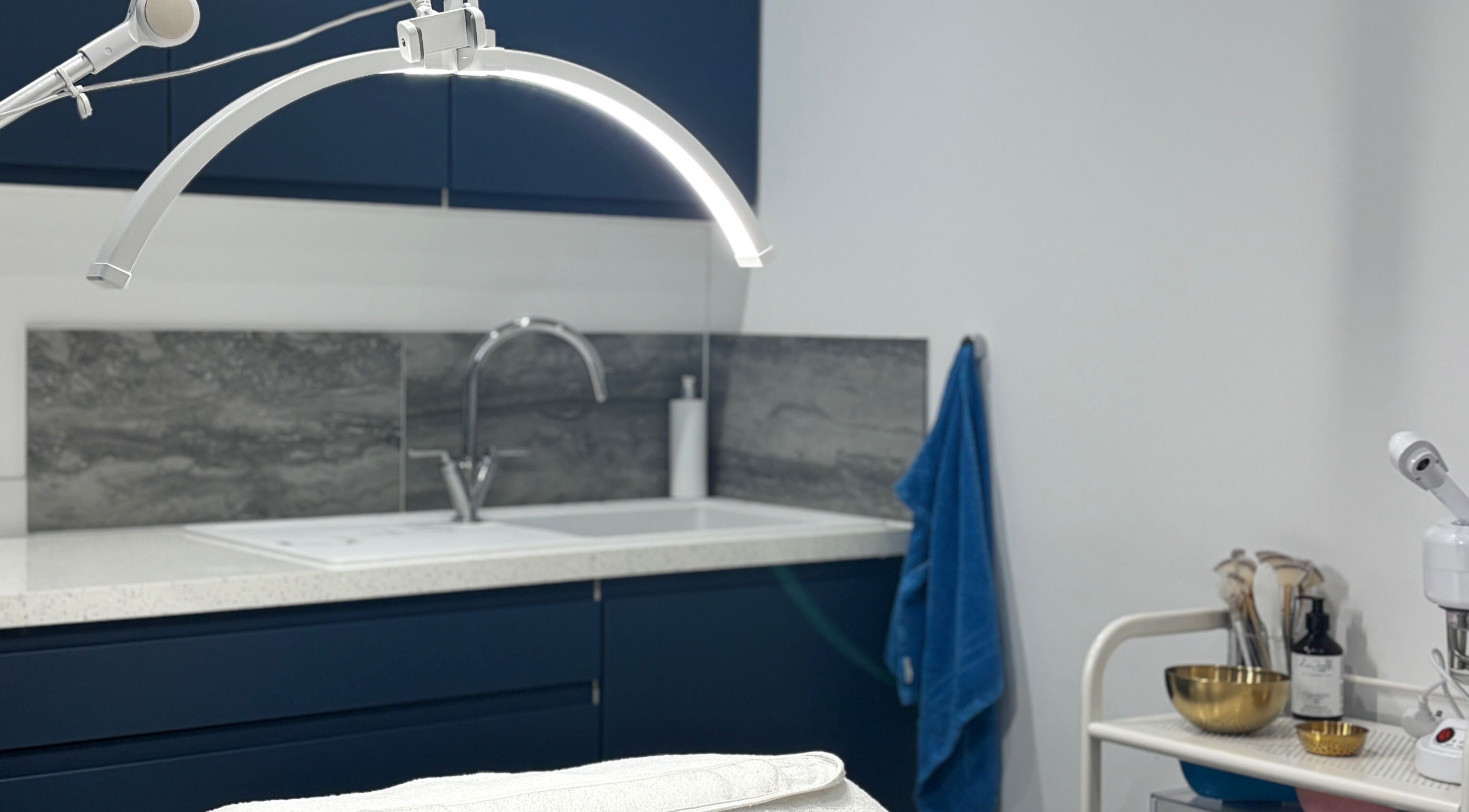 Elegant treatment room at 27 Skin, Lingfield, England, GB with modern fixtures and calming ambiance.