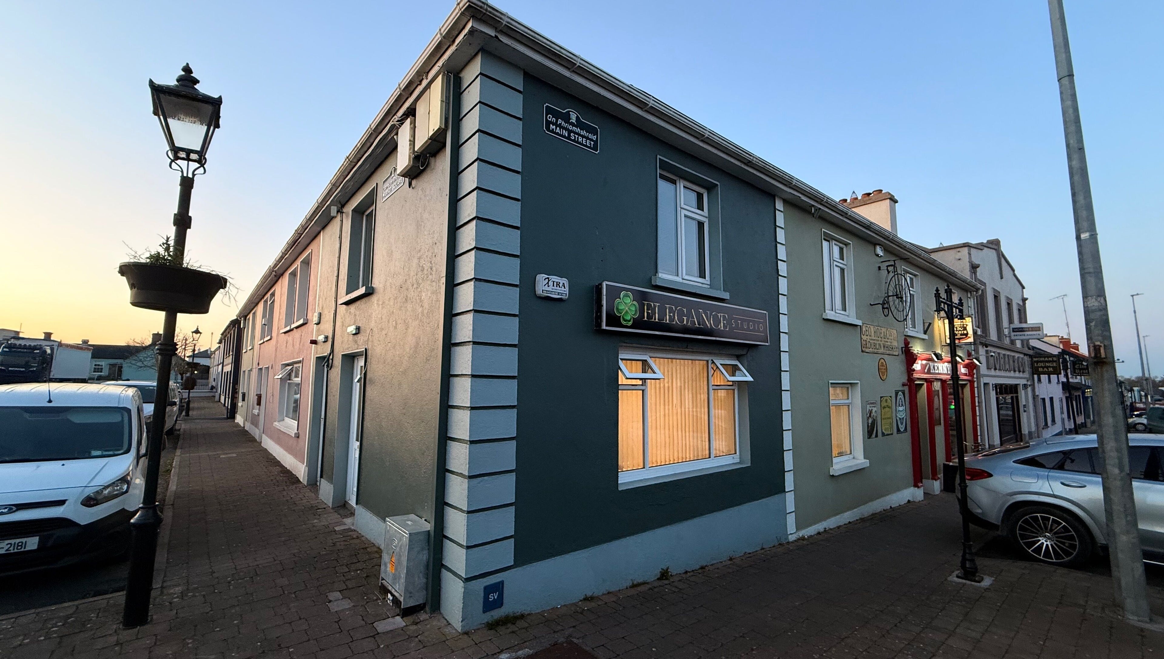 Exterior of Elegance Studio at sunset, Ballygar, County Galway, IE showcasing serene ambiance.