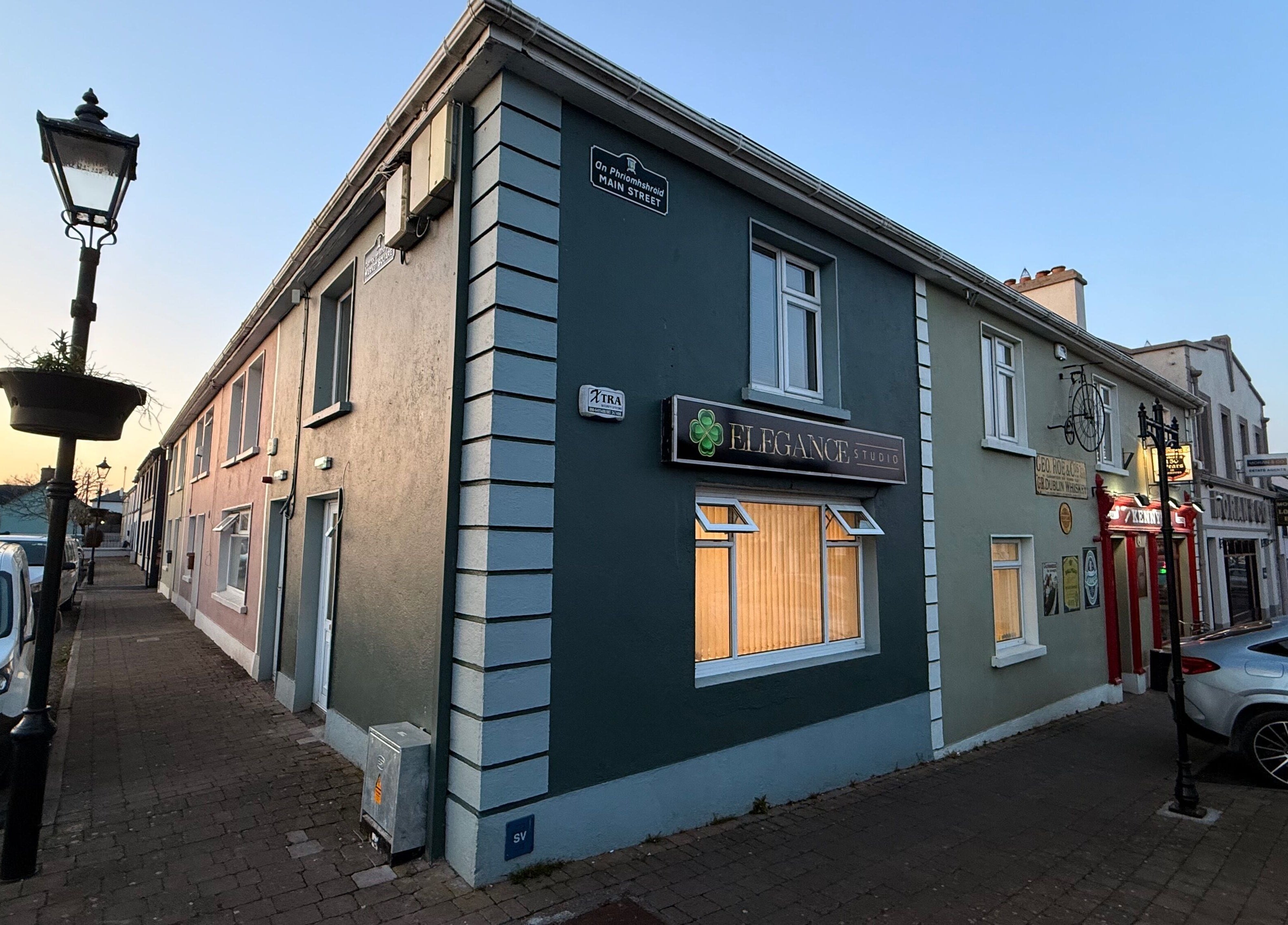 Exterior of Elegance Studio at sunset, Ballygar, County Galway, IE showcasing serene ambiance.