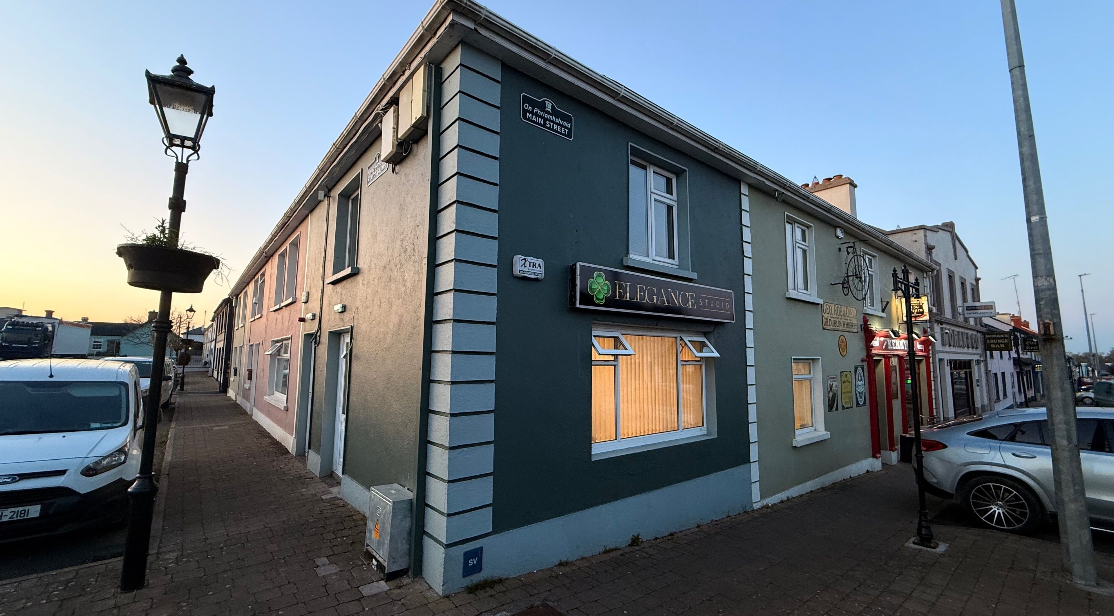 Exterior of Elegance Studio at sunset, Ballygar, County Galway, IE showcasing serene ambiance.