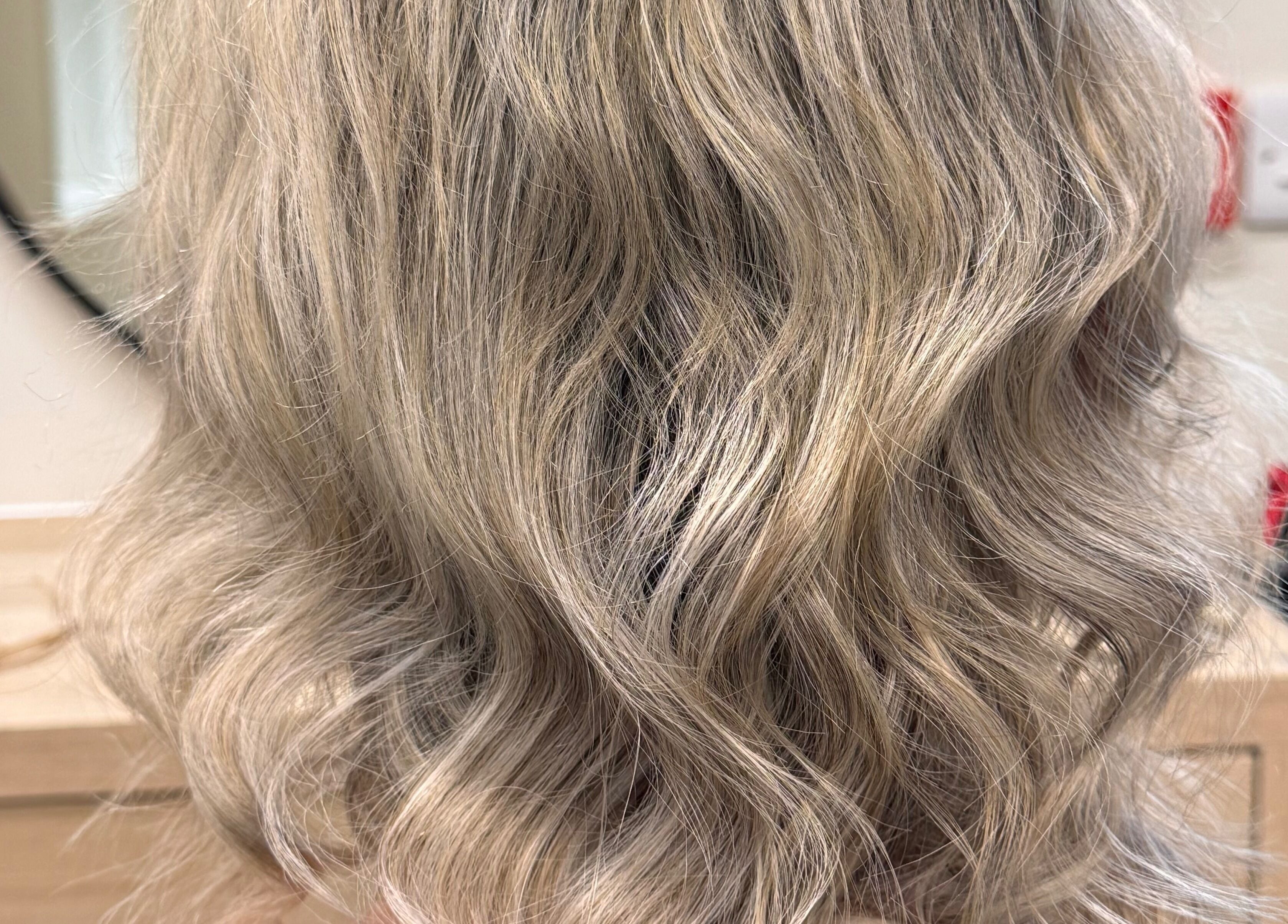 Elegant blonde waves hairstyle at Elegance Studio, Ballygar, County Galway, IE.