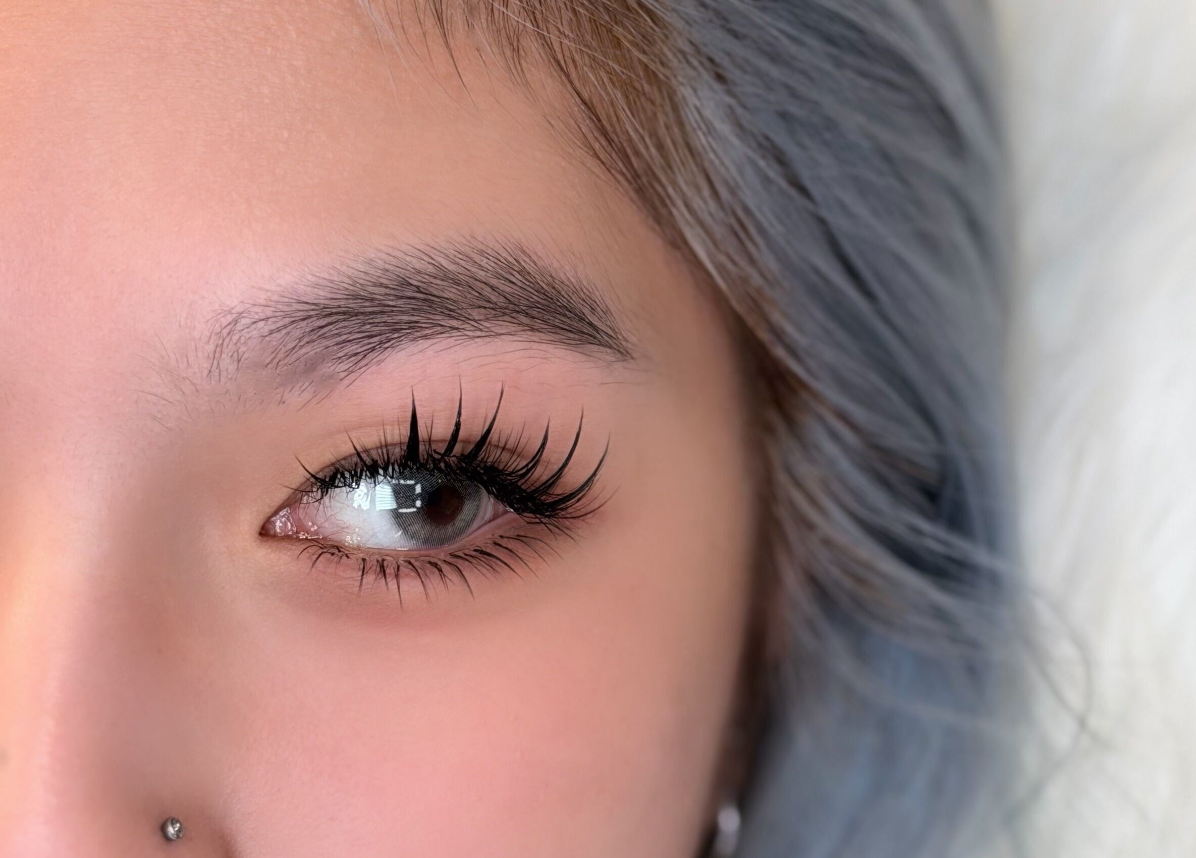 Close-up of styled eyelashes at Blinky Lash in Calgary, Alberta, CA showcasing expertise and elegance.