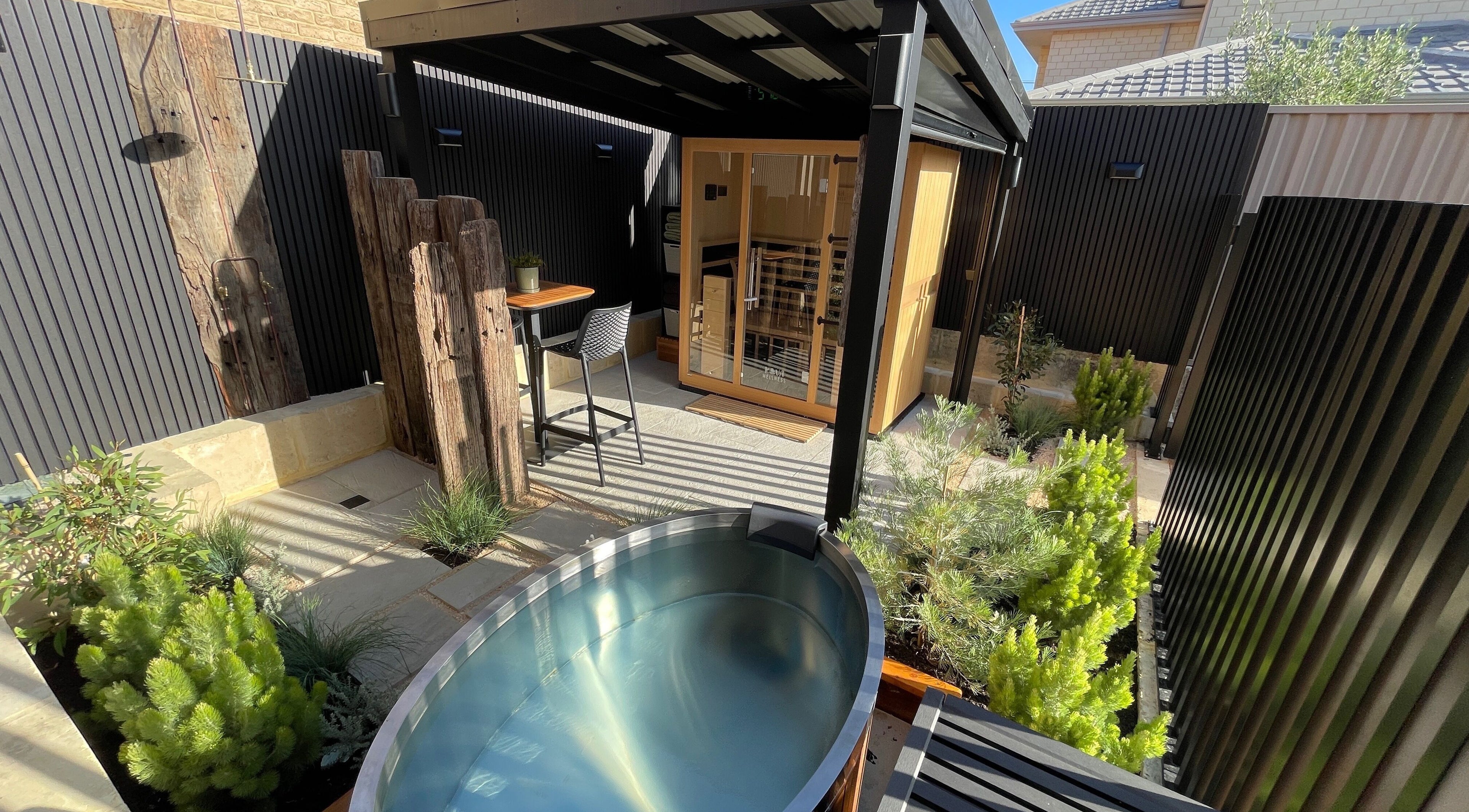Outdoor sauna and ice bath area at KURE Sauna & Ice Bath in Watermans Bay, Western Australia, AU.