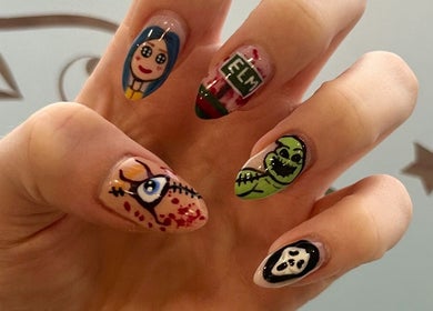 Intricate horror-themed nail art at Kristys Beauty Whitby, Whitby, England, GB. Unique designs on manicured nails.