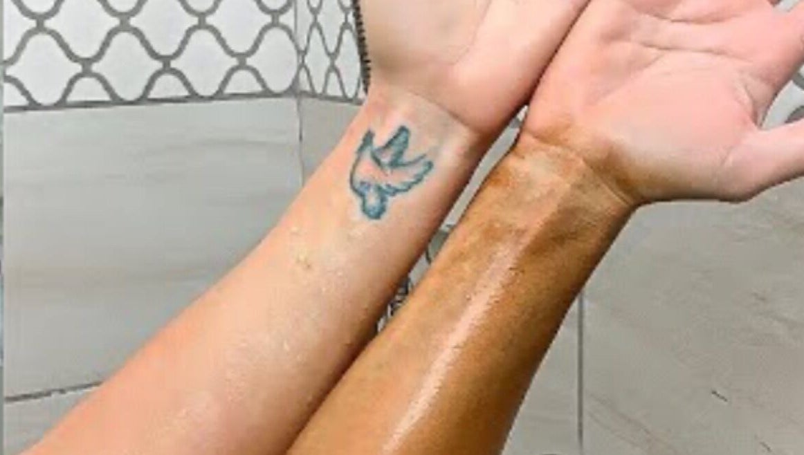 Comparison of untanned and spray-tanned arms at Spray Tan, Melbourne, Victoria, AU. Evident color contrast.