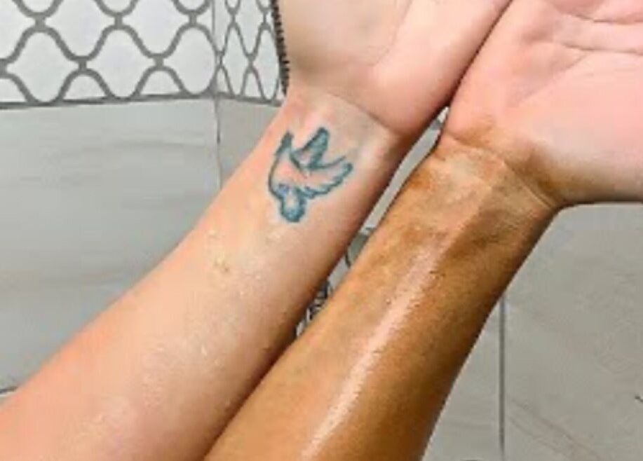 Comparison of untanned and spray-tanned arms at Spray Tan, Melbourne, Victoria, AU. Evident color contrast.