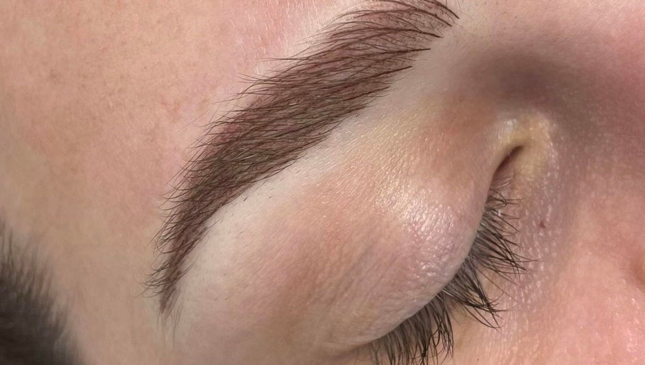 Close-up of expertly shaped eyebrow at Erin Harrington Beauty, Dubai, AE.