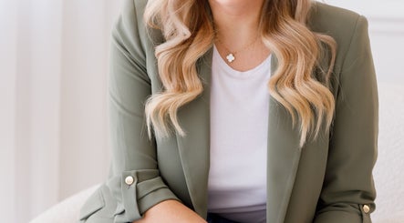 Elegant blonde hair styling at Erin Harrington Beauty, Dubai, AE showcasing professional beauty services.