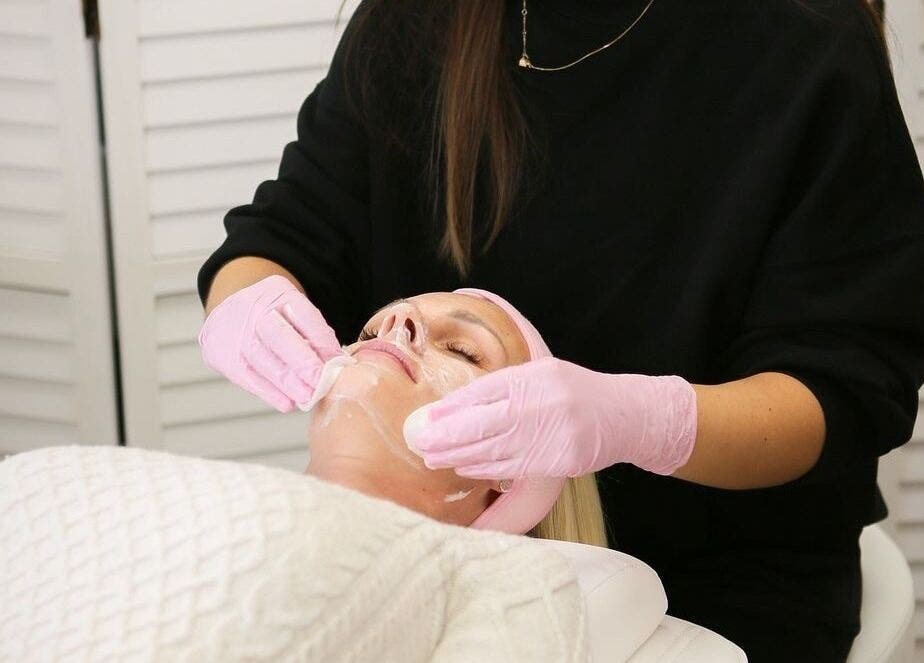 A luxurious facial treatment in progress at Glow Co. Skincare, Walgrave, GB, showcasing expert skincare.