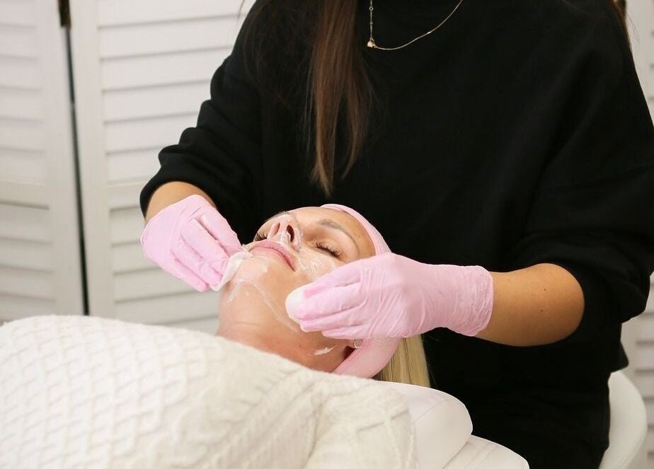 A luxurious facial treatment in progress at Glow Co. Skincare, Walgrave, GB, showcasing expert skincare.