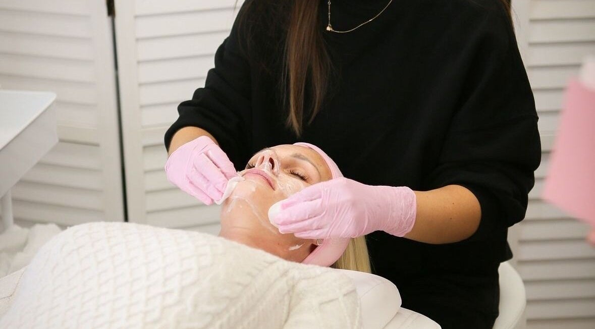 A luxurious facial treatment in progress at Glow Co. Skincare, Walgrave, GB, showcasing expert skincare.