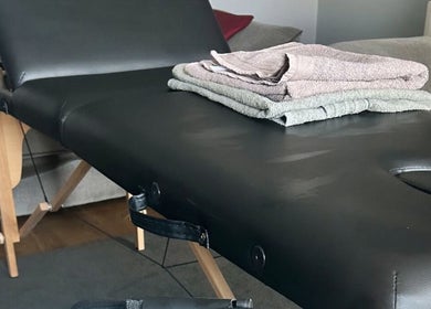 Comfortable massage table with soft towels at Pollock Sports Therapy, Coleraine, Northern Ireland, GB.
