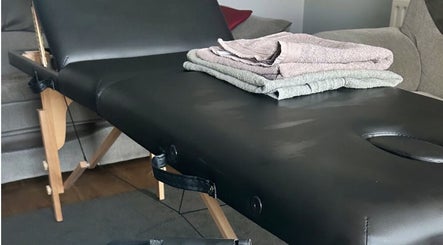 Comfortable massage table with soft towels at Pollock Sports Therapy, Coleraine, Northern Ireland, GB.