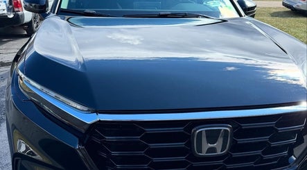 Polished car hood detailing at Dos-Amigos Car Detailing in Staunton, Virginia, US.