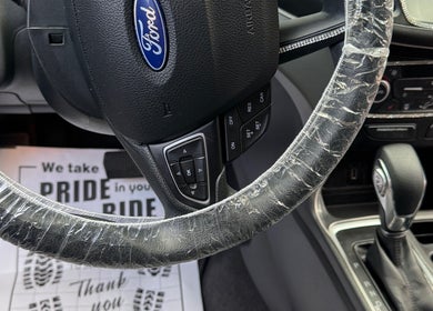 Interior view of a polished car steering wheel at Dos-Amigos Car Detailing in Staunton, Virginia, US.