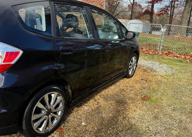 Freshly detailed black car at Dos-Amigos Car Detailing, Staunton, Virginia, US, showcasing immaculate finish.
