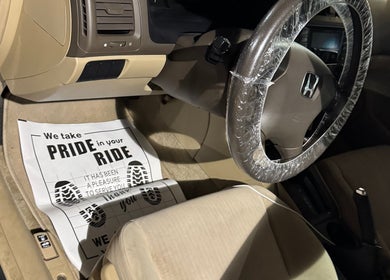 Clean car interior at Dos-Amigos Car Detailing in Staunton, Virginia, US, featuring protective covers.