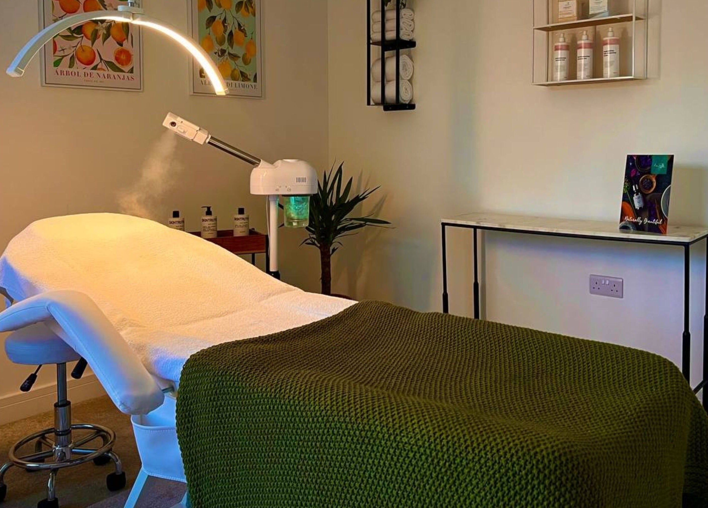 Relaxing spa treatment room at Essential Recovery, Yarm, England, GB, featuring a cozy bed and soothing decor.