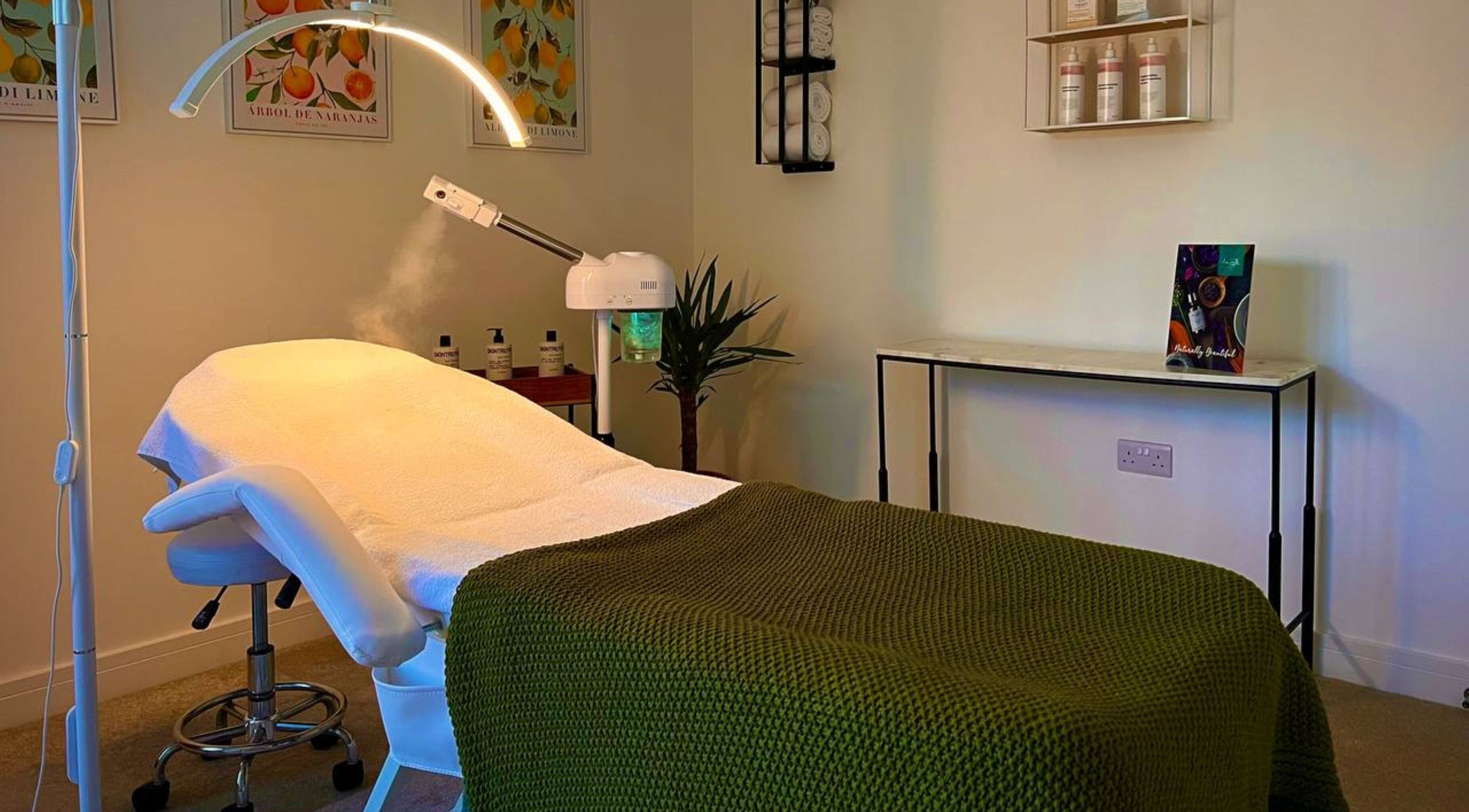 Relaxing spa treatment room at Essential Recovery, Yarm, England, GB, featuring a cozy bed and soothing decor.