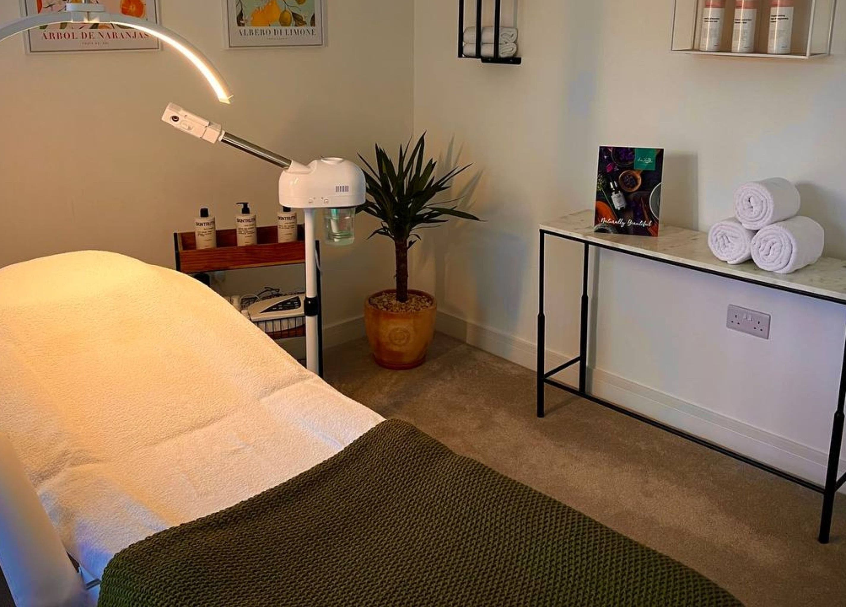 Relaxing treatment room at Essential Recovery, Yarm, England featuring cozy bed and decor.