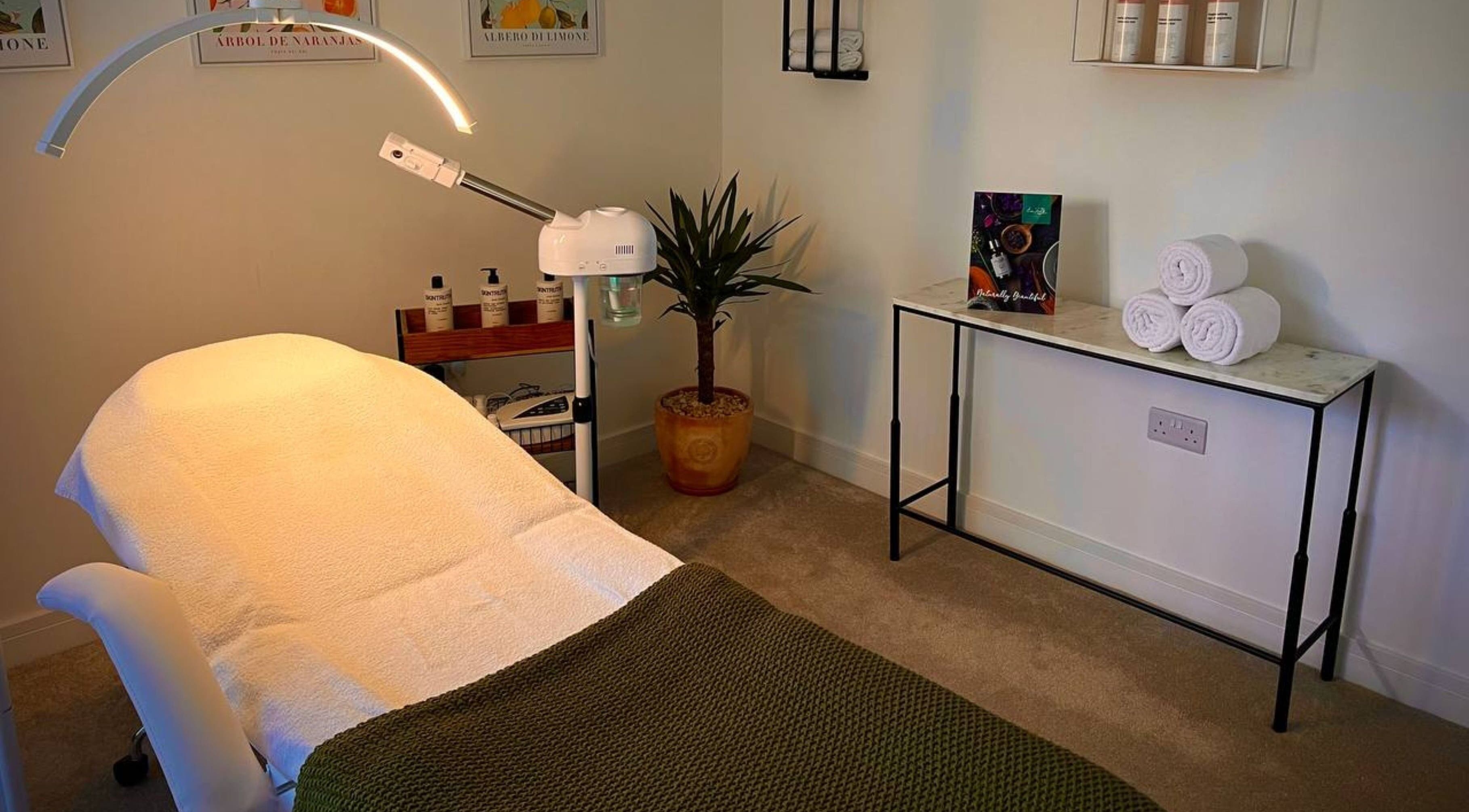 Relaxing treatment room at Essential Recovery, Yarm, England featuring cozy bed and decor.