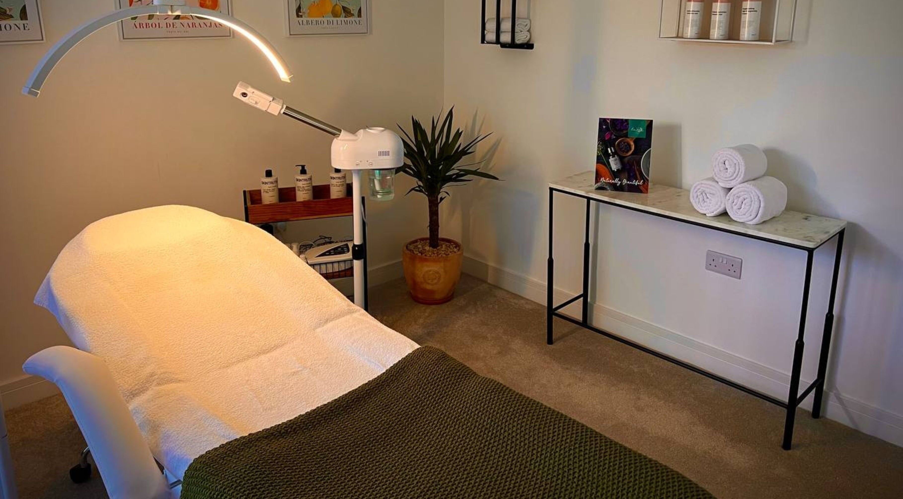 Relaxing treatment room at Essential Recovery, Yarm, England featuring cozy bed and decor.