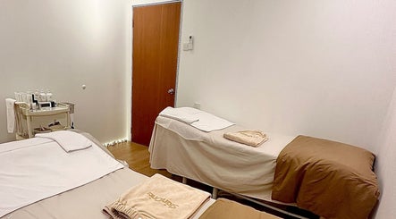 Cozy therapy room at Skin Oria Beauty in Johor Bahru, Johor, MY with twin massage tables.