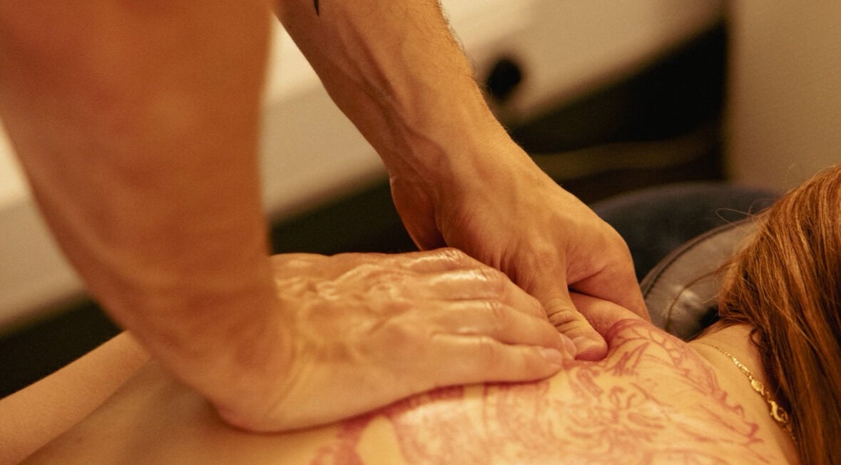 Liam Collins - Sports Massage Therapist & Lifestyle Coach performing massage in Liverpool, England, GB.